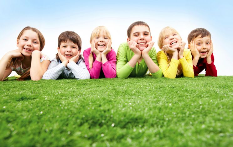 106449727-kids-on-the-grass